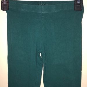 Dark green leggings.